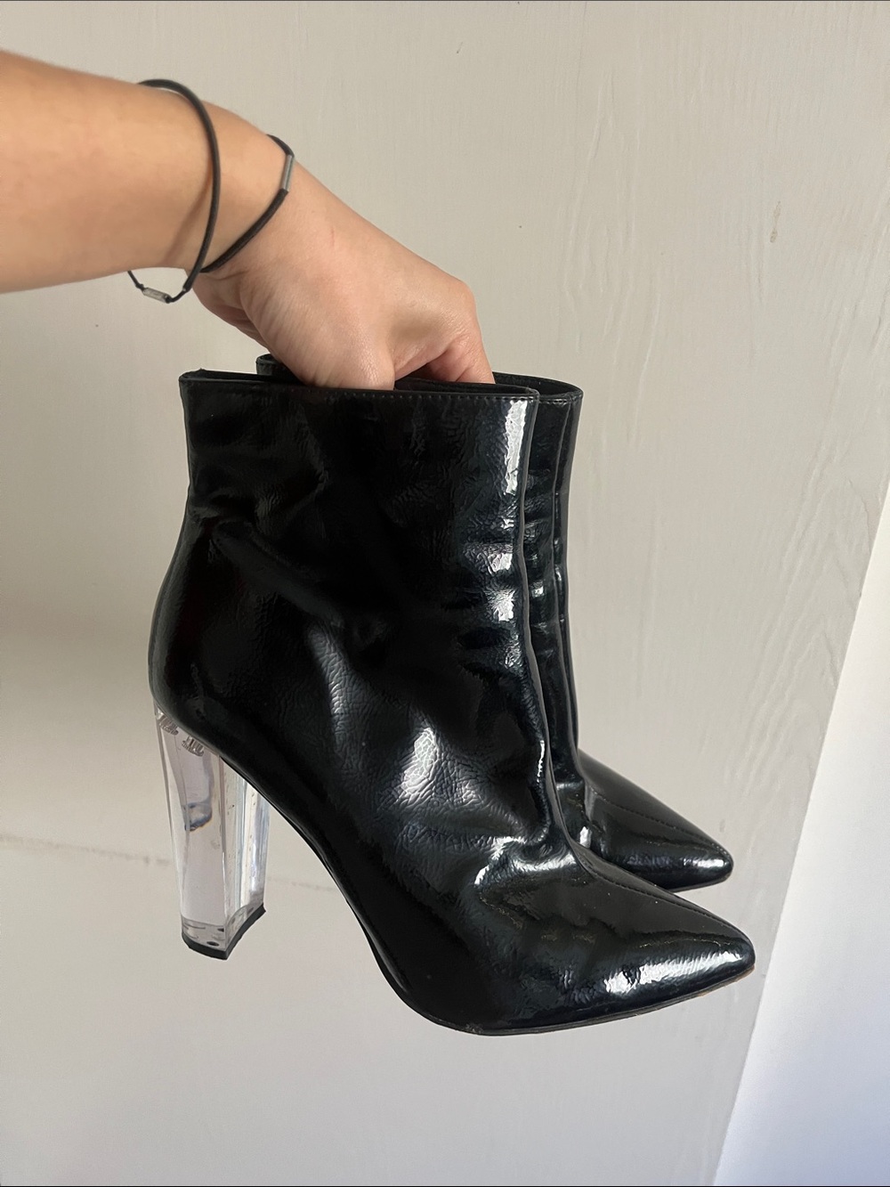 Jessica Simpson black leather ankle boot with clear heel